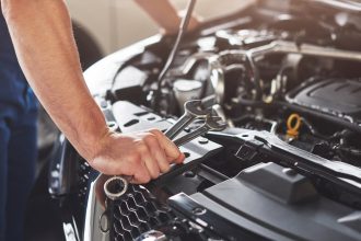 a man working on engine rebuild